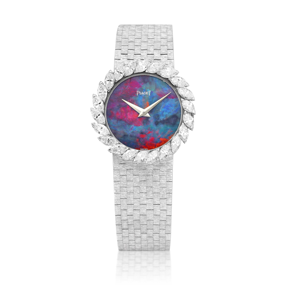 Reference 924  A white gold and diamondset bracelet watch with opal dial Circa 1970    924  1970