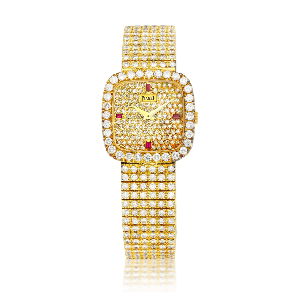 Reference 9902  A yellow gold diamond and rubyset bracelet watch Circa 1980    9902  1980