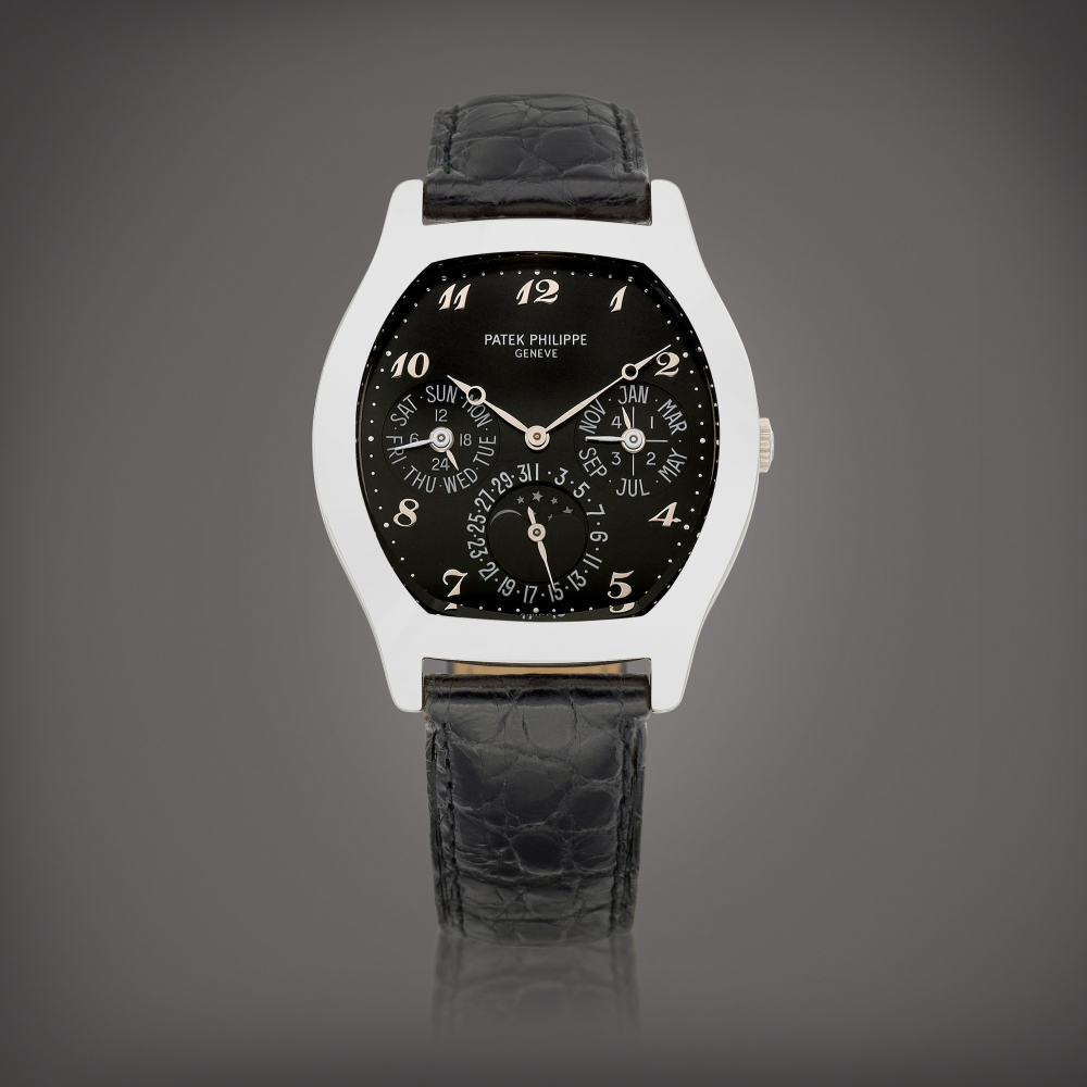 Reference 5041  A white gold perpetual calendar wristwatch with day date moon phases 24 hours and leap year indication Made in 2003    5041  242003