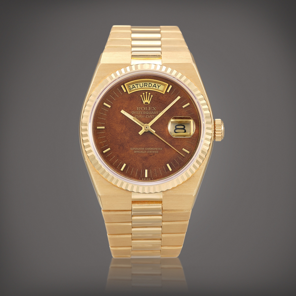 Oyster Quartz DayDate Reference 19018  A yellow gold bracelet watch with day date and wood dial Circa 1980    Oyster Quartz DayDate 19018  1980