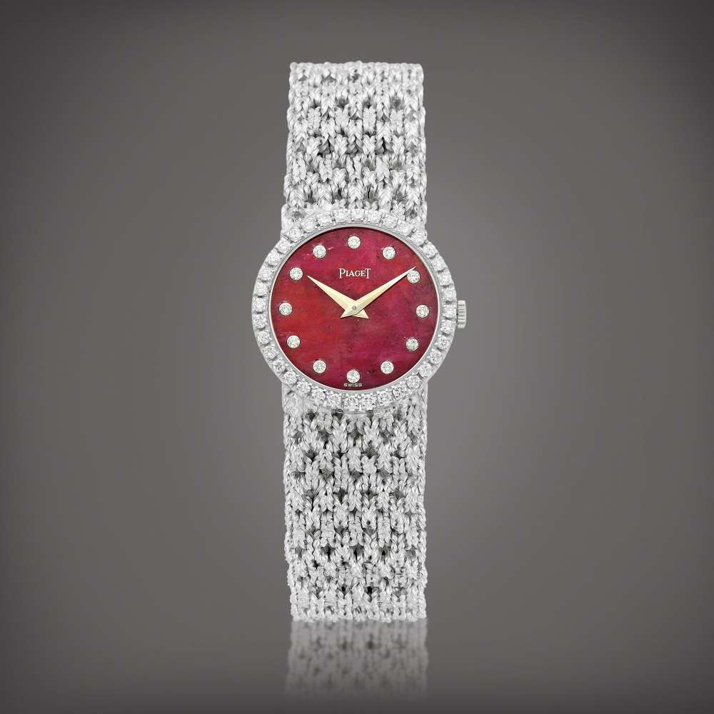 Reference 9706 N 39  A white gold and diamondset bracelet watch with rubellite dial Circa 1970    9706 N 39  1970