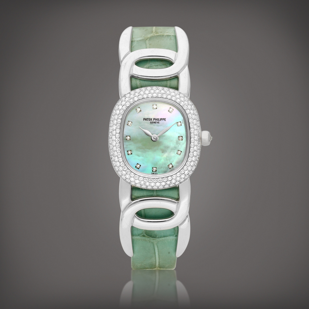 Golden Ellipse Reference 4831  A white gold and diamondset wristwatch with motherofpearl dial Circa 1996    Golden Ellipse 4831  1996