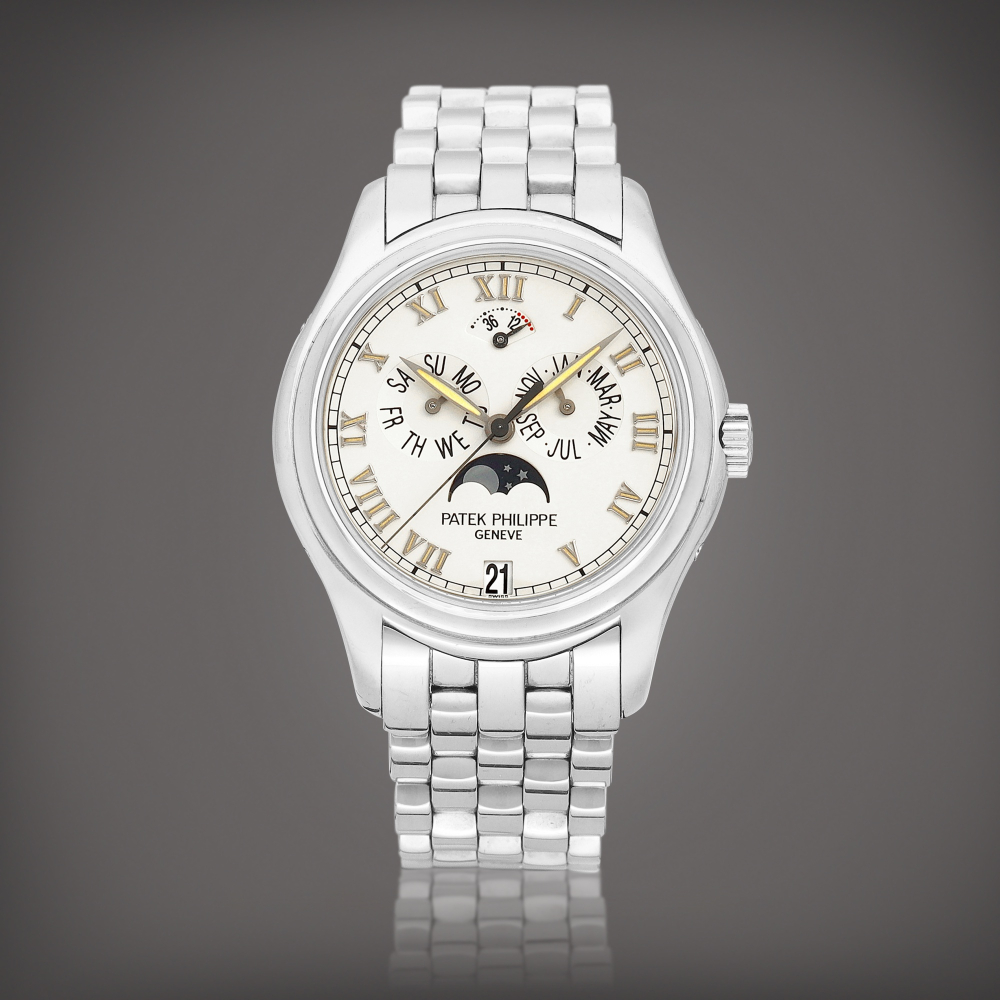 Reference 5036  A white gold annual calendar wristwatch with moon phases power reserve indication and bracelet Made in 1999    5036  1999