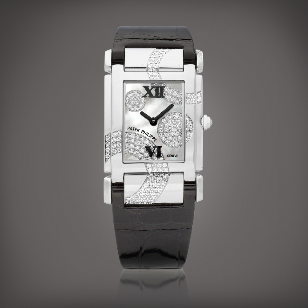 Twenty4 Reference 4914  A white gold and diamondset wristwatch with motherofpearl dial Circa 2009    Twenty4 4914  2009