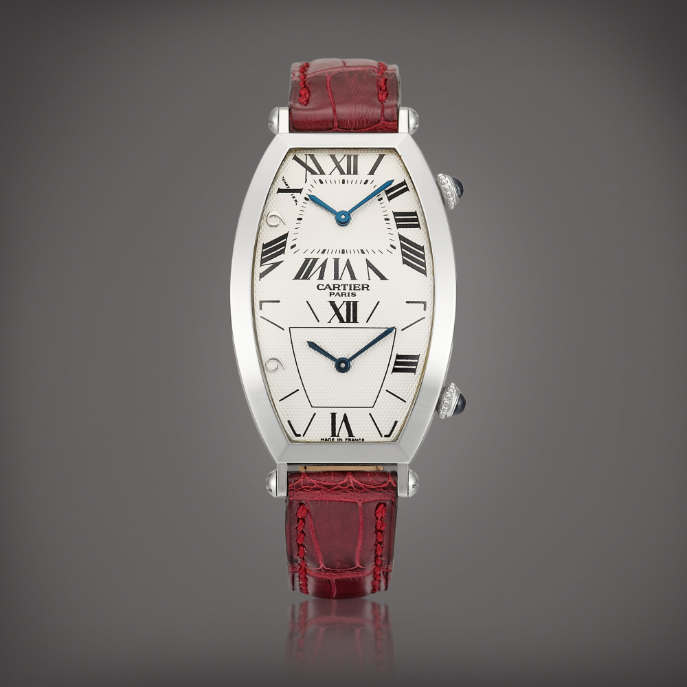 PROPERTY FROM A PROMINENT COLLECTOR  Cartier  Tonneau Two Time Zones "CPCP", Reference 2487 A limited edition platinum dual time zone wristwatch, Made to commemorate the handover of Macau to China, Circa 1999 