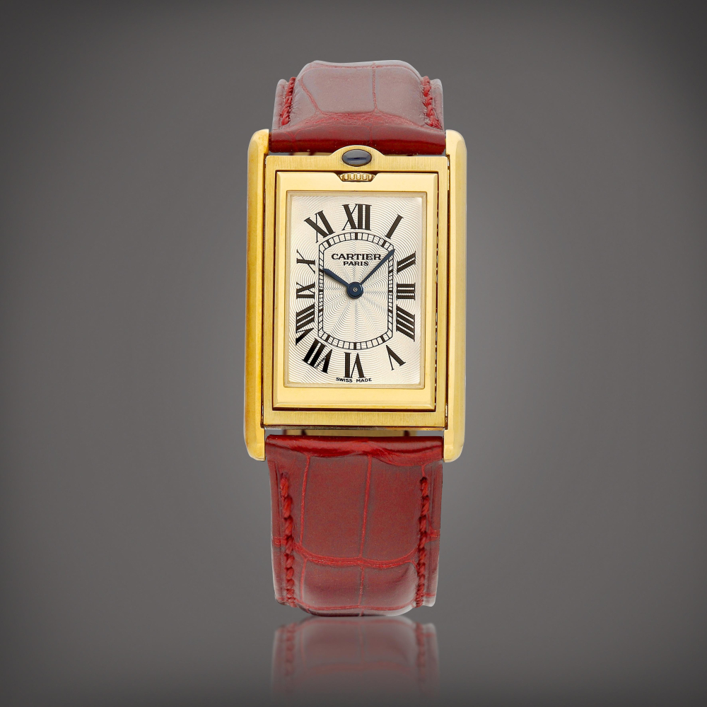 PROPERTY FROM A PROMINENT COLLECTOR  Cartier  Tank Basculante Millenium "CPCP", Reference 2391 A limited edition yellow gold reversible wristwatch, Circa 2000 
