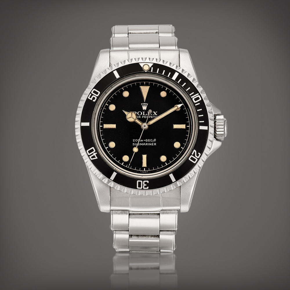 PROPERTY FROM A NOTABLE COLLECTOR  Rolex  Submariner, Reference 5512 A stainless steel wristwatch pointed crown guards and bracelet, Circa 1961 