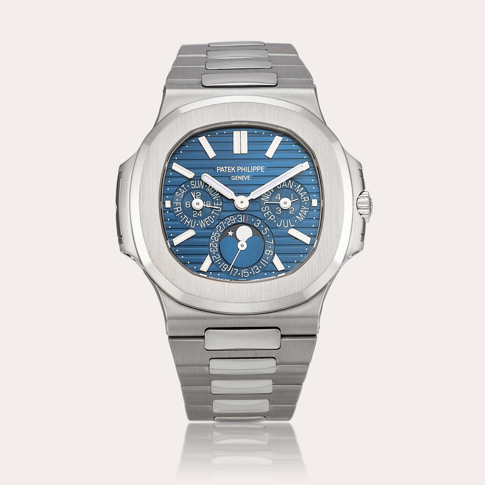 Patek Philippe Nautilus, Reference 5740 | A white gold perpetual calendar bracelet watch with moon phases, 24 hours and leap year indication, Circa 2023 