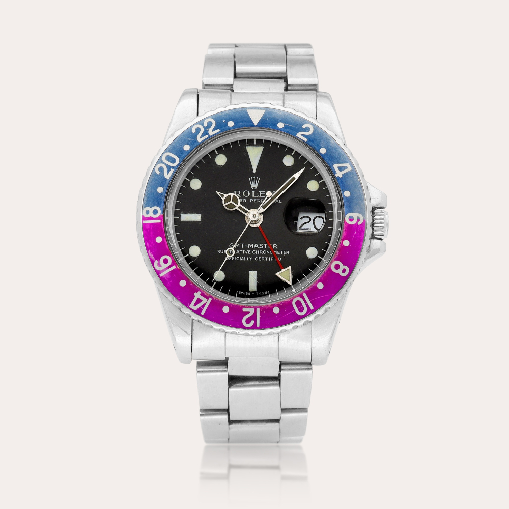 Rolex GMT-Master 'Long E', Reference 1675 | A stainless steel dual time wristwatch with date and bracelet, Circa 1968 | 勞力士 | GMT-Master 'Long E' 型號1675 | 精鋼兩地時間鏈帶腕錶，備日期顯示，約1968年製
