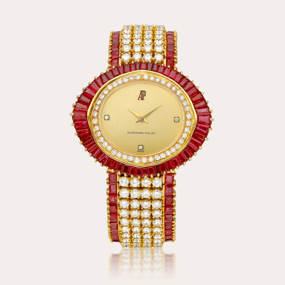 Audemars Piguet A yellow gold, diamond and ruby-set bracelet watch, Circa 1978 | 愛彼 | 黃金鑲鑽石及紅寶石鏈帶腕錶，約1978年製