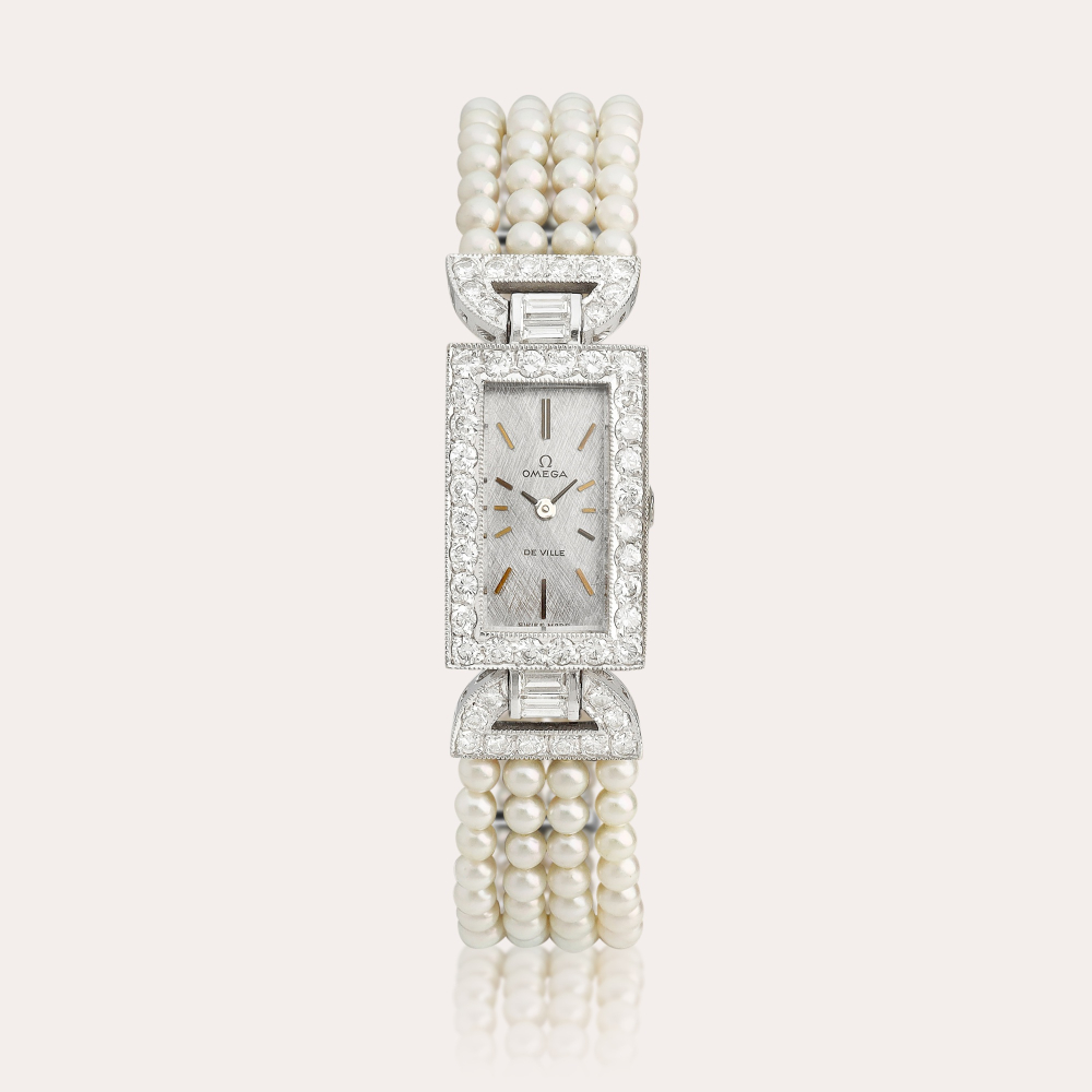 Omega De Ville | A white gold and diamond-set wristwatch with cultured pearl bracelet, Circa 1967 | 歐米茄 | 碟飛系列 | 白金鑲鑽石腕錶，備珍珠鏈帶，約1967年製