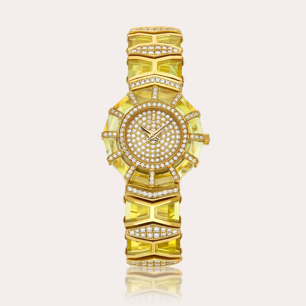 Corum Limelight, Reference 24.895.65 M245 | A yellow gold, diamond and synthetic yellow sapphire-set bracelet watch, Circa 1993 | Limelight 型號24.895.65 M245 | 黃金鑲鑽石及合成黃色藍寶石鏈帶腕錶，約1993年製