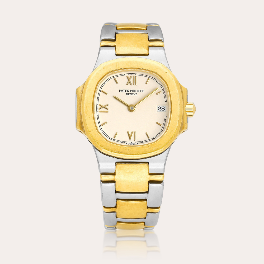 Patek Philippe Nautilus, Reference 4700 | A yellow gold and stainless steel bracelet watch with date, Circa 1990 | 百達翡麗 | Nautilus 型號4700 | 黃金及精鋼鏈帶腕錶，備日期顯示，約1990年製