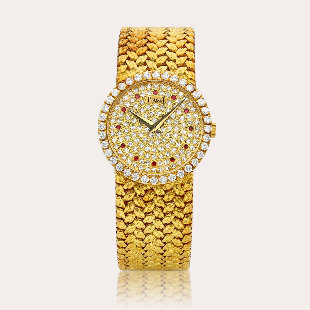 Piaget Reference 9706 D 2 | A yellow gold, diamond and ruby-set bracelet watch, Circa 1970 | 伯爵 | 型號 9706 D 2 | 黃金鑲鑽石及紅寶石鏈帶腕錶，約1970年製