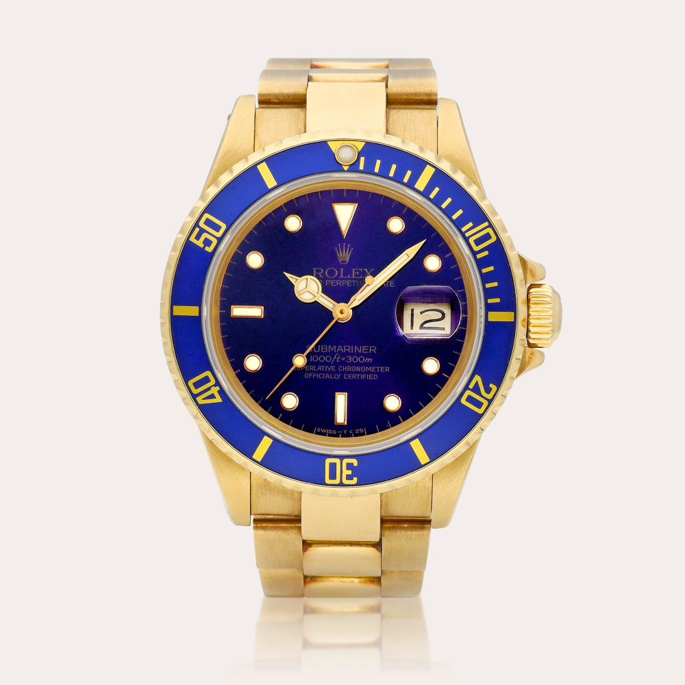 Rolex Submariner , Reference 16808 | A yellow gold wristwatch with date and bracelet, circa 1988 | 勞力士 | Submariner 型號16808 | 黃金鏈帶腕錶，備日期顯示，約1988年製