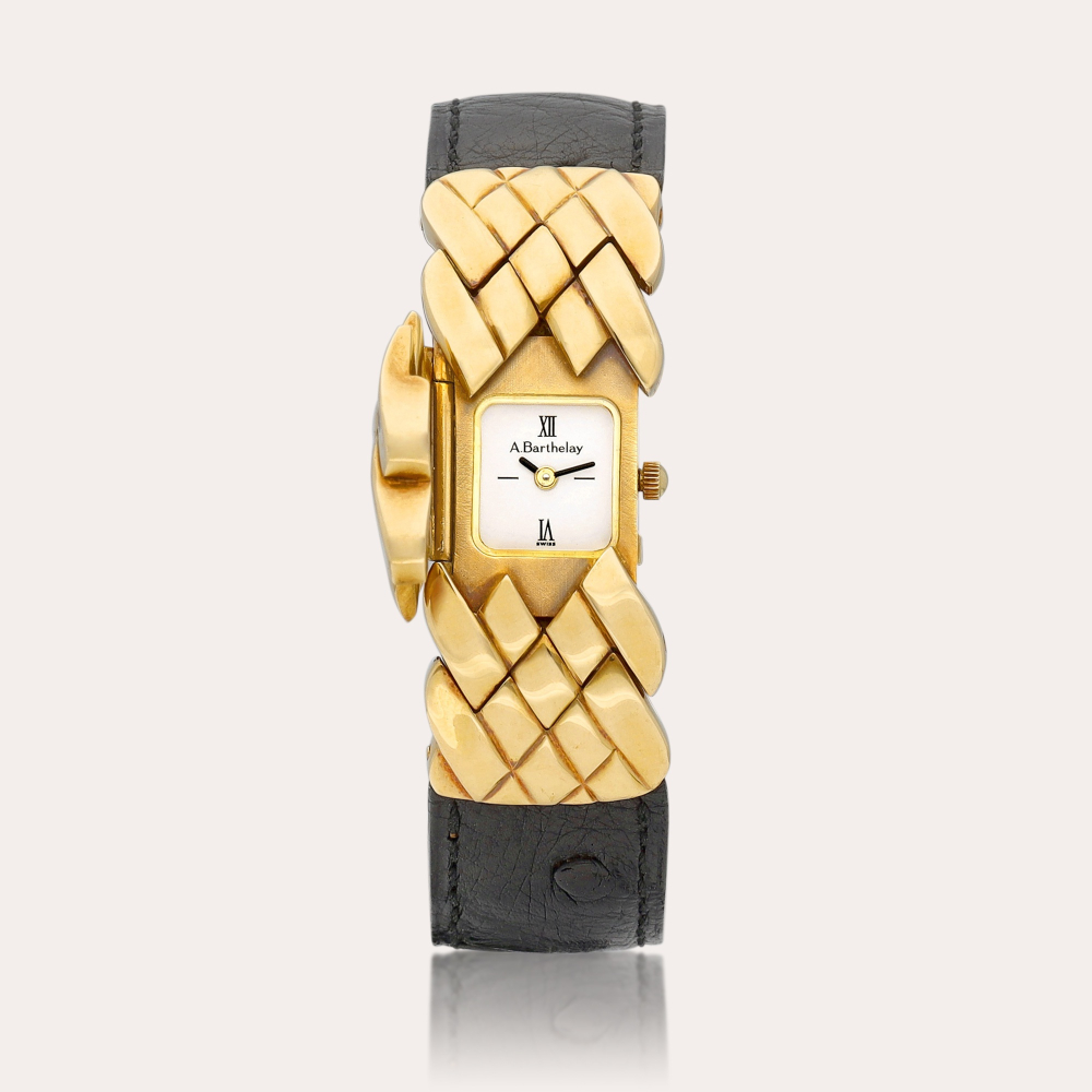 Alexis Barthelay Alexis | A yellow gold wristwatch with concealed dial, Circa 1990 | 黃金腕錶，備隱藏式錶盤，約1990年製