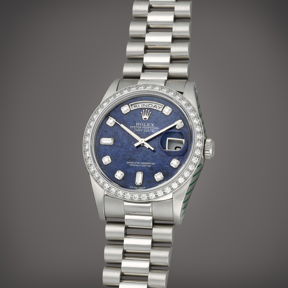Rolex Day-Date. Reference 18346 | A platinum and diamond-set wristwatch with sodalite dial, day, date and bracelet | Circa 1991