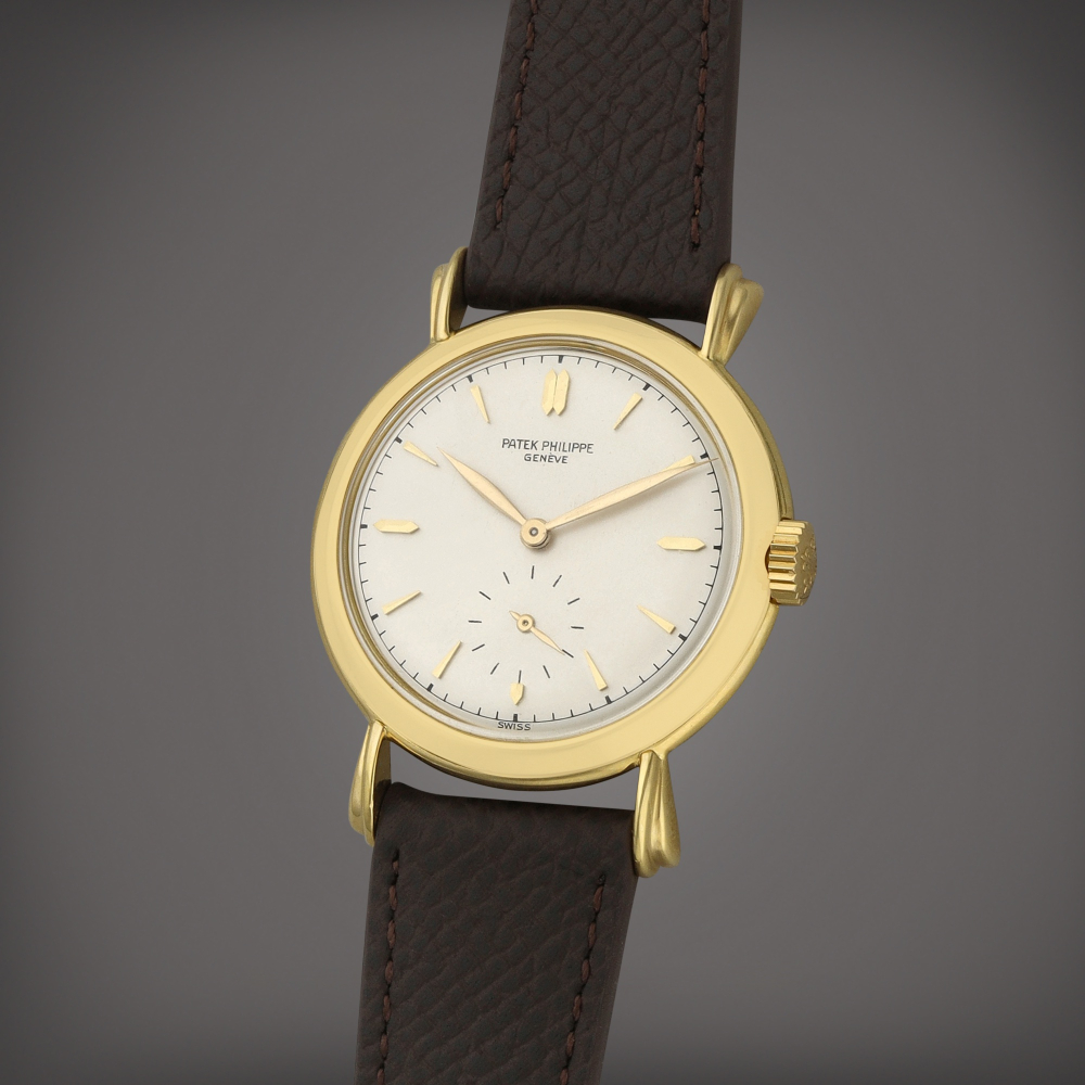 Patek Philippe Reference 2453 | A yellow gold wristwatch | Circa 1951
