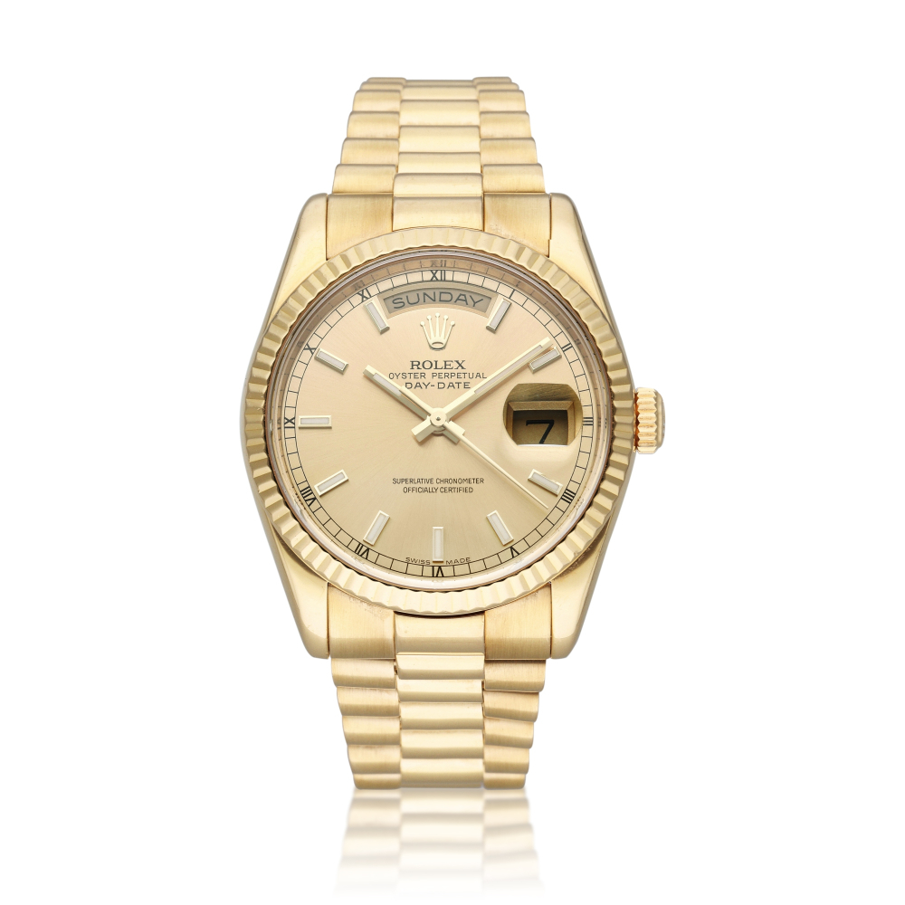 Reference 118238 Day-Date | A yellow gold automatic wristwatch with day, date, and bracelet, Circa 2010