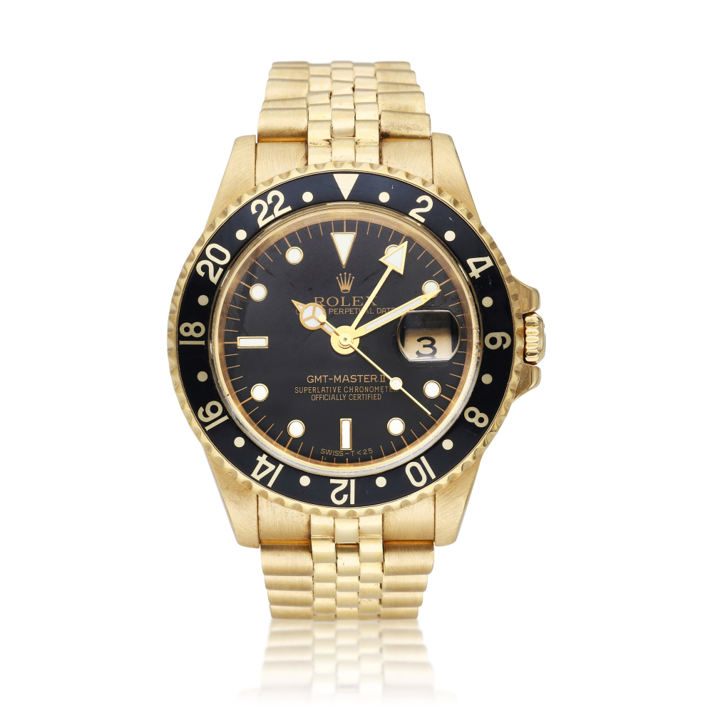 Reference 16718 GMT-Master II | A yellow gold automatic dual time wristwatch with date and bracelet, Circa 1991