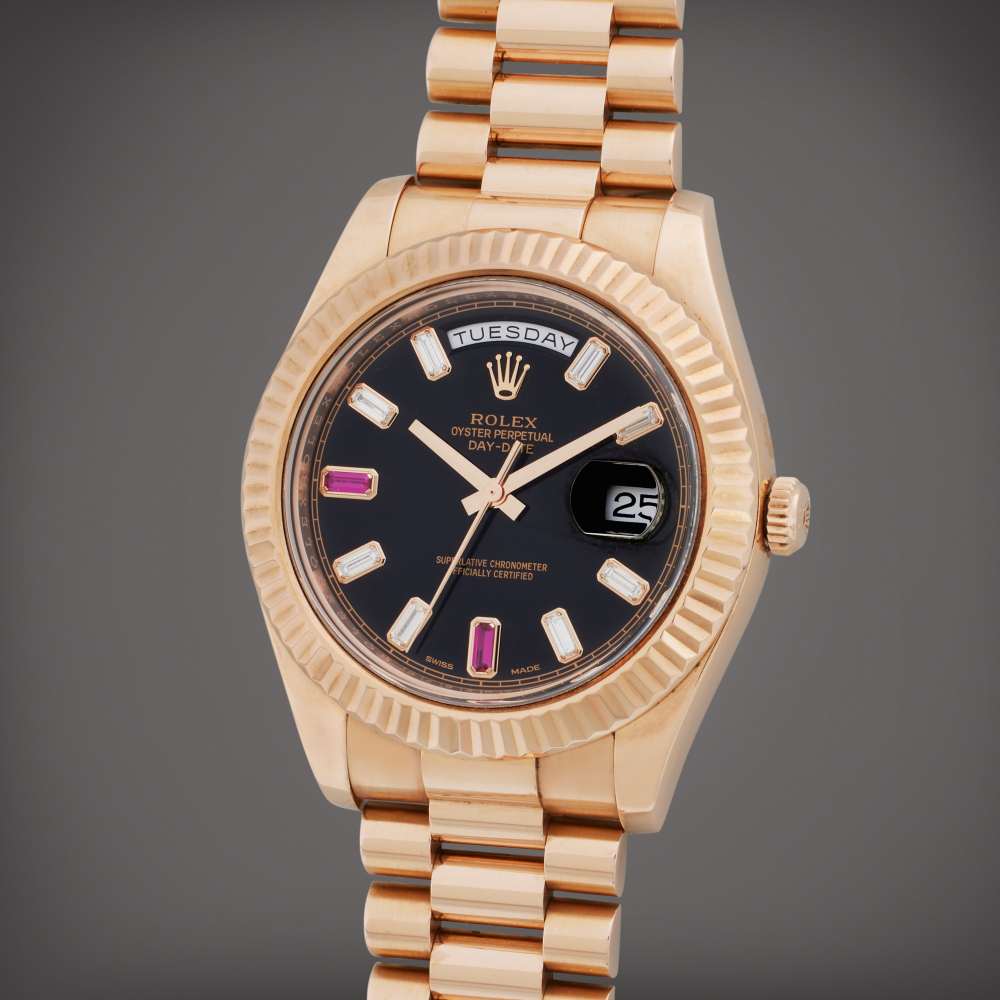 Reference 218235 Day-Date II | A pink gold, diamond and ruby-set automatic wristwatch with day, date and bracelet, Circa 2014 | The Hammer Collection