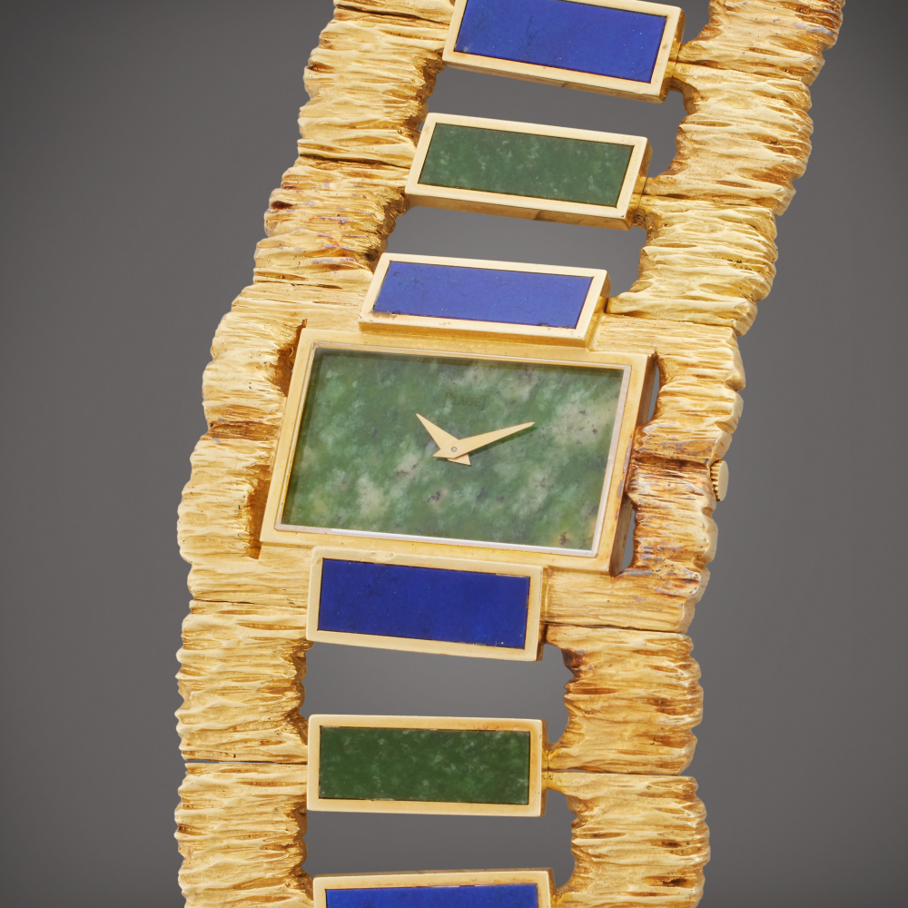 Reference 9212 D 76 | A yellow gold nephrite and lapis lazuli bracelet watch, Circa 1970