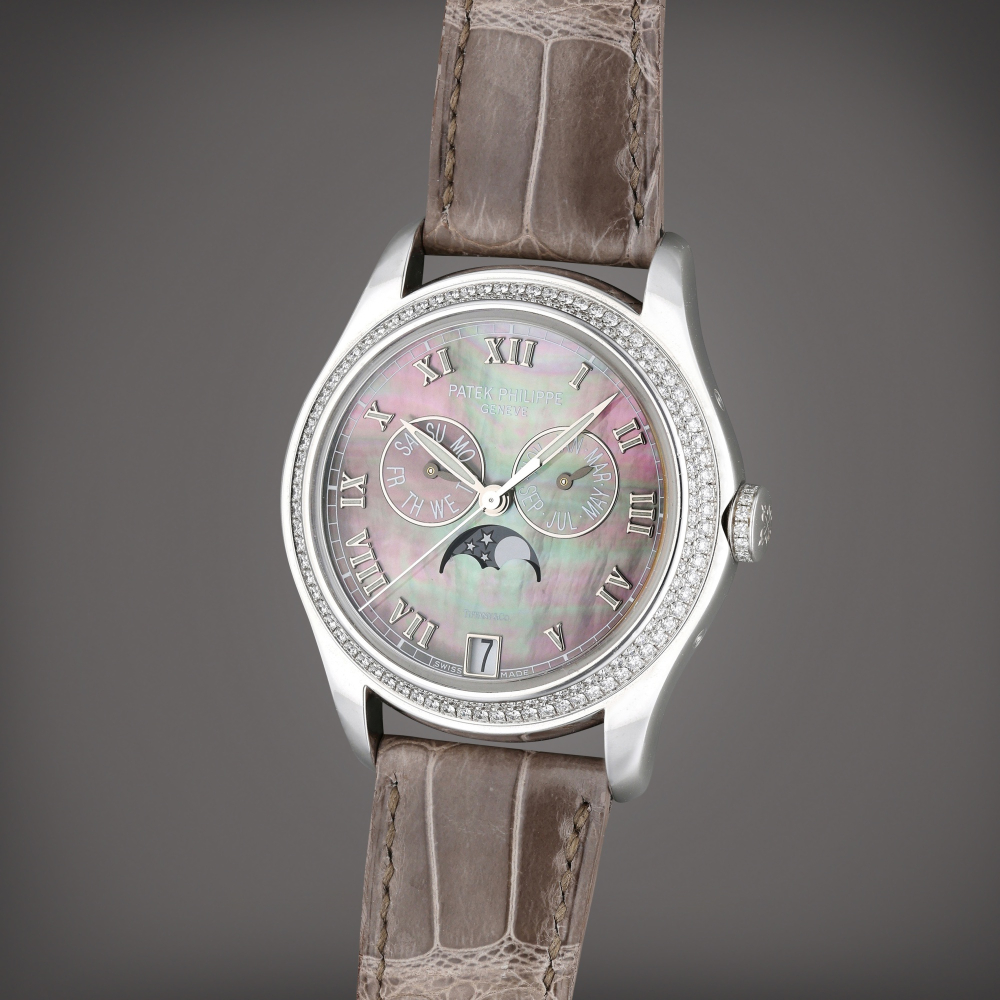 Reference 4936G-001 Retailed by Tiffany & Co.: | A white gold and diamond-set annual calendar wristwatch with moon phases and Mother of pearl dial, Circa 2008