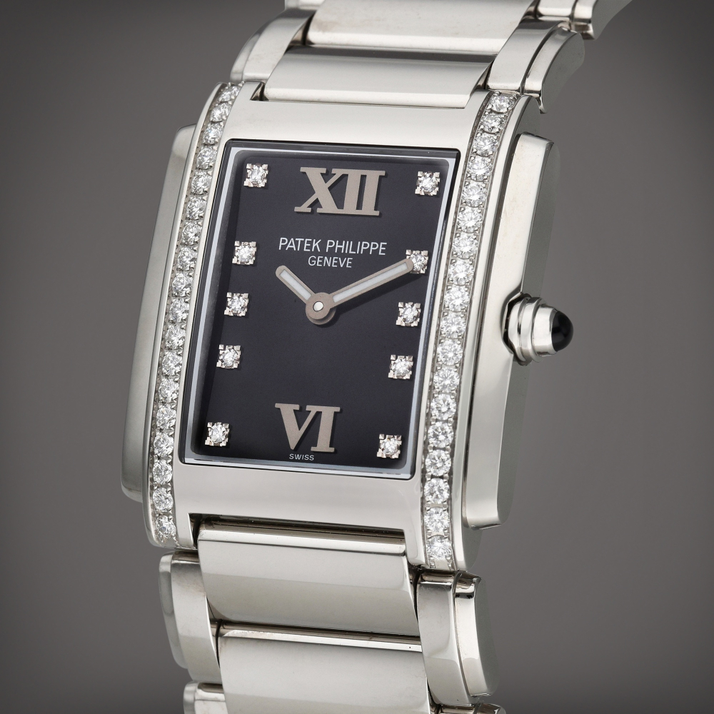 Patek Philippe Reference 4910/10A-001 Twenty-4 | A stainless steel and diamond-set wristwatch with bracelet, Circa 2015