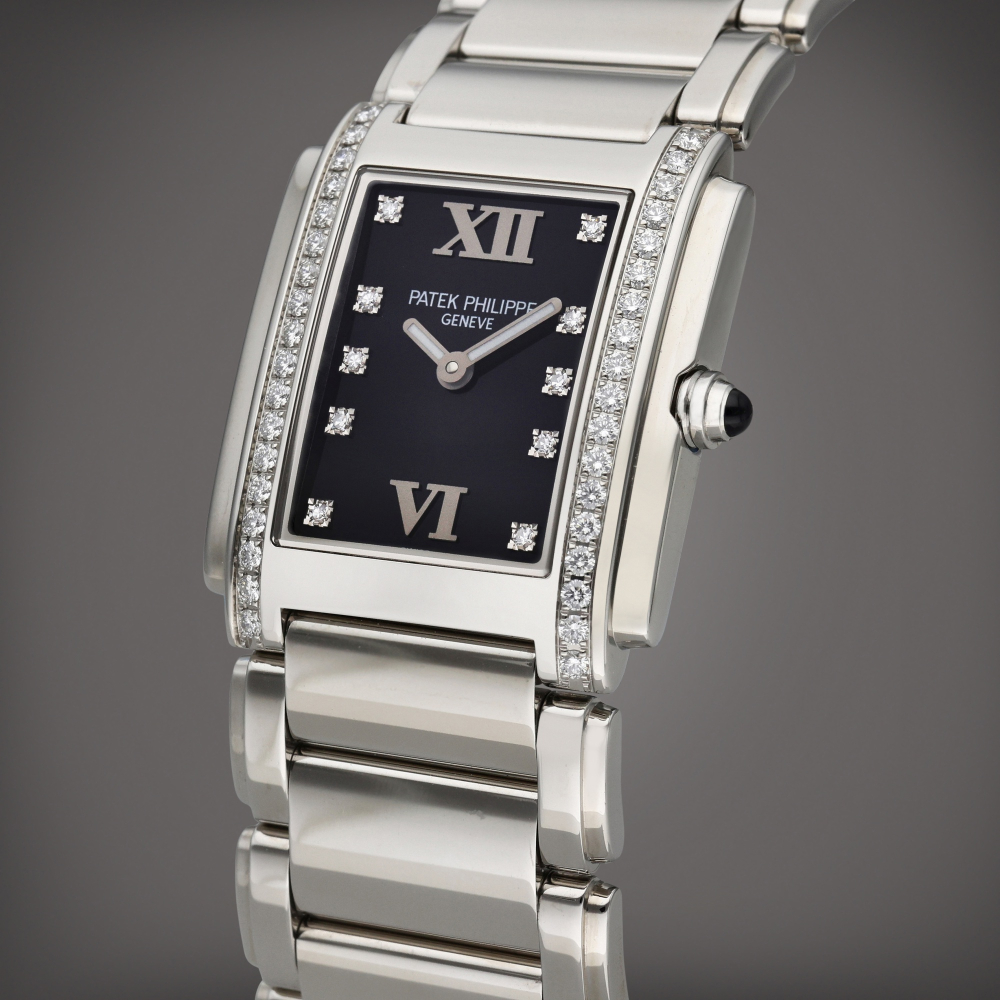 Patek Philippe Reference 4910/10A-001 Twenty-4 | A stainless steel and diamond-set wristwatch with bracelet, Circa 2015
