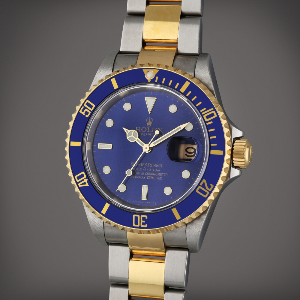 Rolex Reference 16613 T Submariner | A yellow gold and stainless steel automatic wristwatch with date and bracelet, Circa 2008