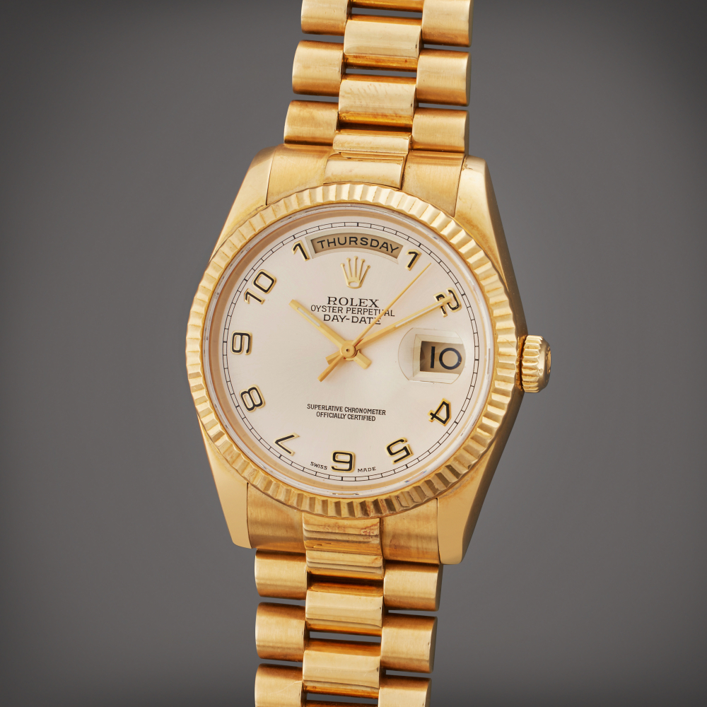 Rolex Reference 118238 Day-Date | A yellow gold automatic wristwatch with day, date, and bracelet, Circa 2001