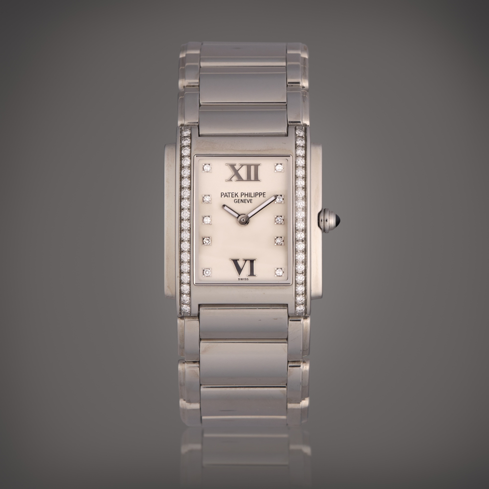 Patek Philippe Reference 4910/10A-011 Twenty-4 | A stainless steel and diamond-set wristwatch with bracelet, Circa 2015