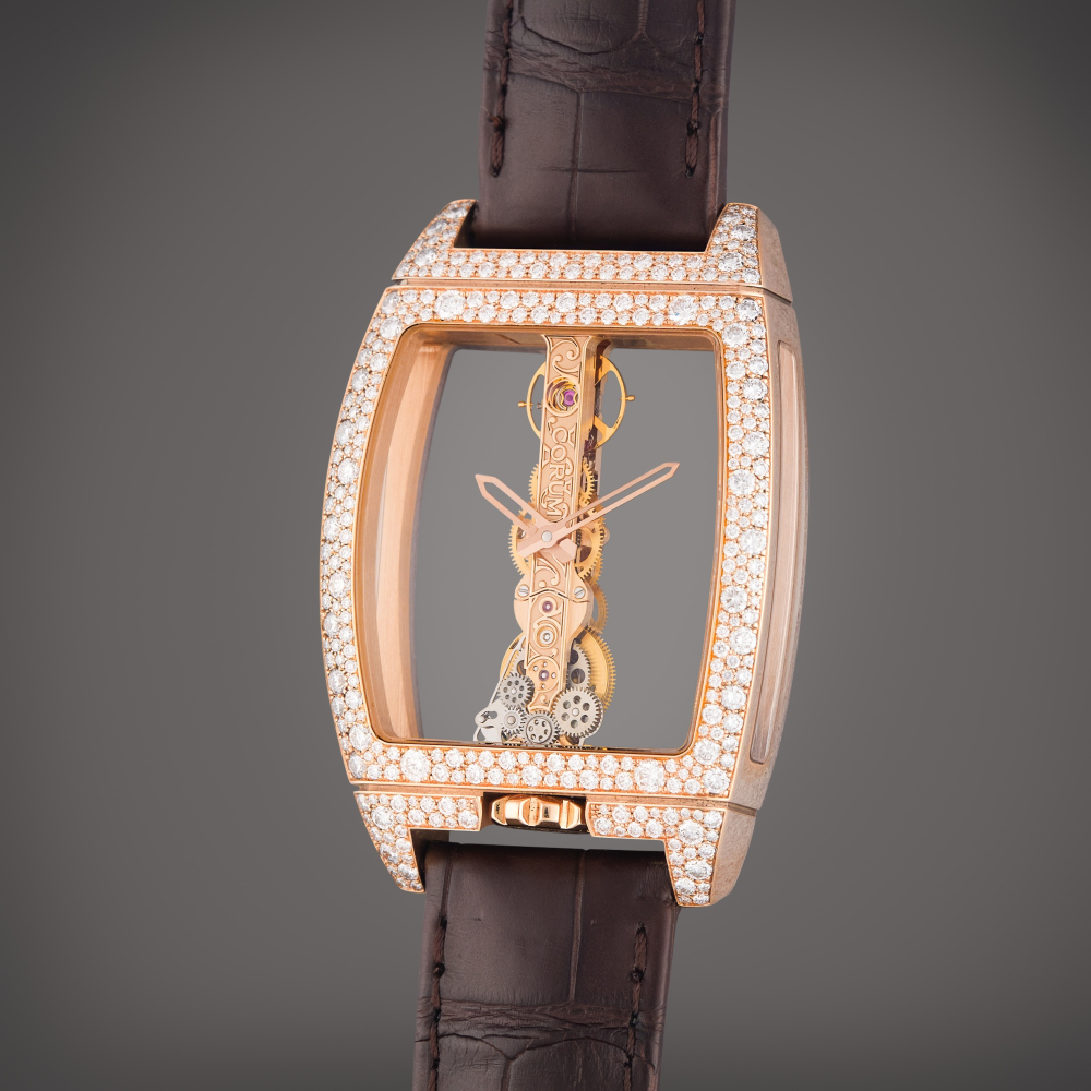 Corum Reference 113.358.85/0F02 0000 Golden Bridge | A pink gold and diamond-set skeletonized wristwatch, Circa 2020
