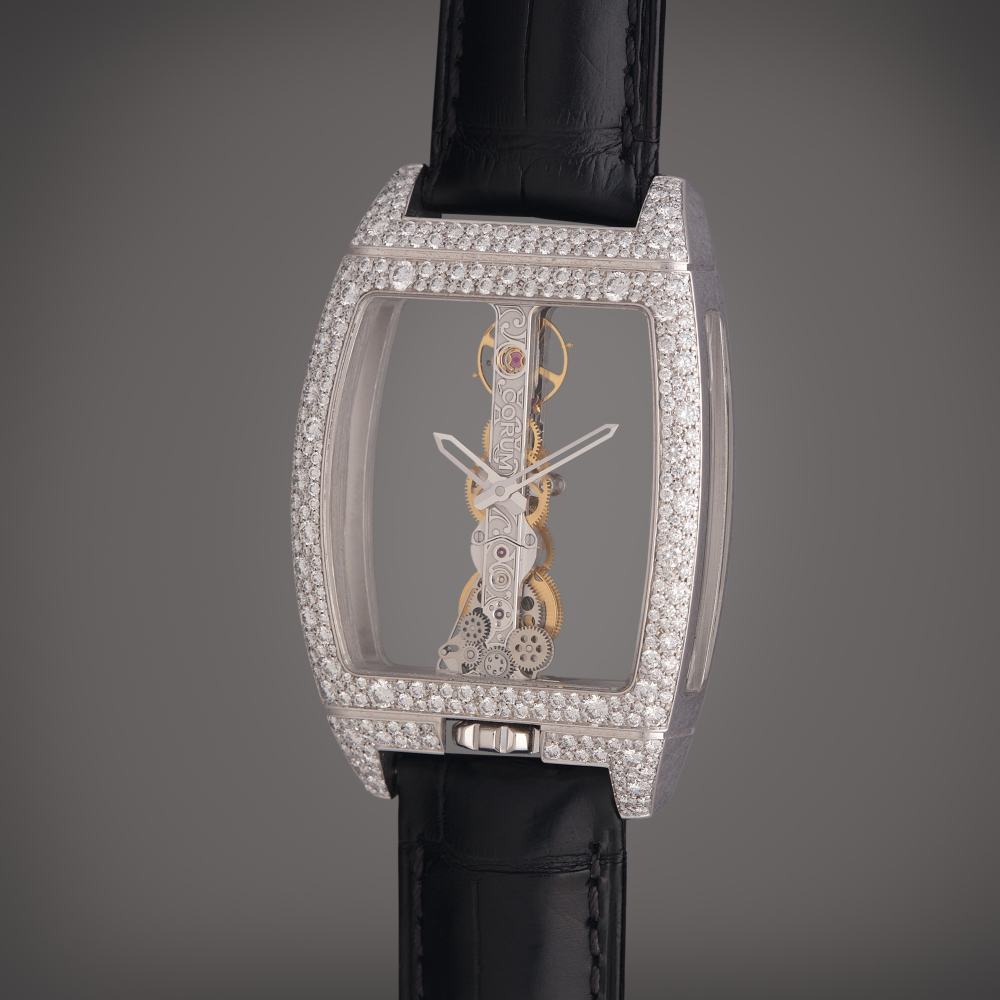 Corum Reference 113.358.69/0F01 0000 Golden Bridge | A white gold and diamond-set skeletonized wristwatch, Circa 2020