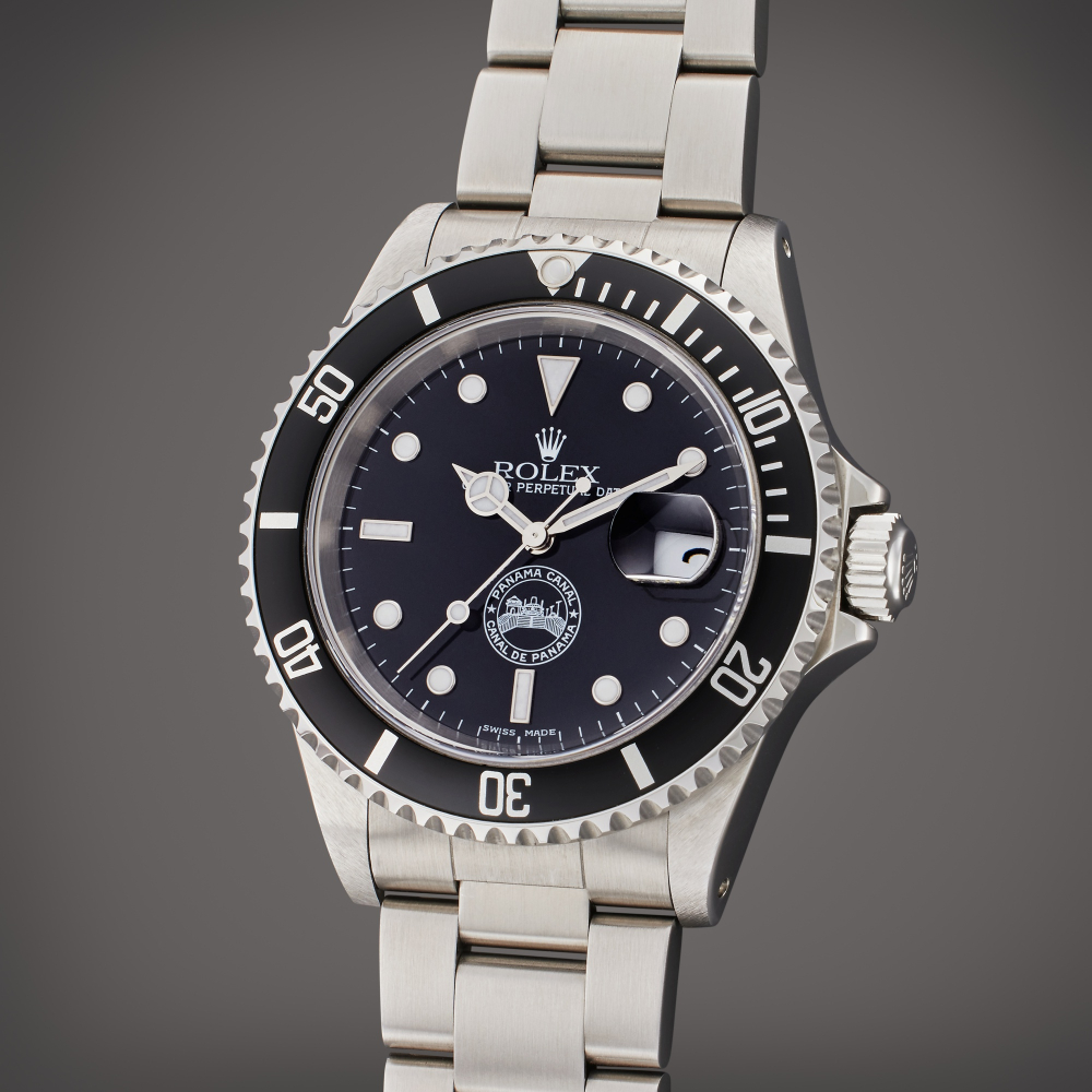 PROPERTY OF A PRIVATE COLLECTOR Rolex Reference 16610 Submariner ‘Panama Canal’ | A stainless steel automatic wristwatch with date and bracelet, Made to commemorate the transfer of the canal from the United States to Panama, Circa 1999