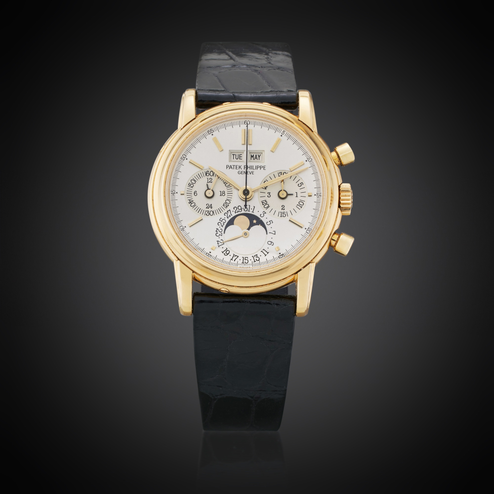 Patek Philippe Reference 3970 'First Series' | A yellow gold perpetual calendar chronograph wristwatch with moon phases, The second example ever produced numbered 875’001, Owned and Worn by Tom Brady, Made in 1986