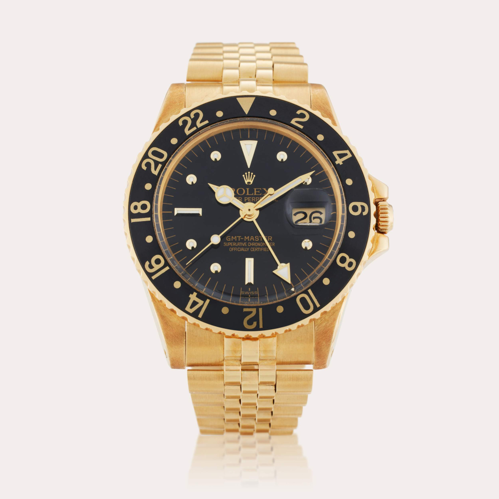 Rolex Reference 1675 GMT-Master ‘Nipple dial’ | A yellow gold automatic dual time zone wristwatch with date and bracelet, Circa 1971