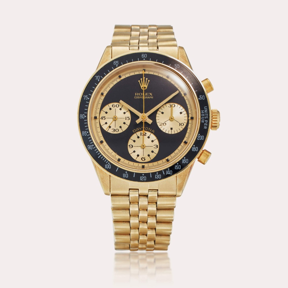 PROPERTY FROM THE FAMILY OF THE ORIGINAL OWNER Rolex Reference 6238 Transitional Daytona 'John Player Special' | A rare yellow gold chronograph wristwatch with bracelet, Circa 1968