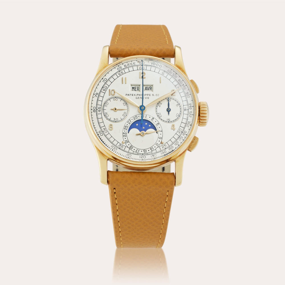 Patek Philippe Reference 1518 | A yellow gold perpetual calendar chronograph wristwatch with moon phases, Made in 1945
