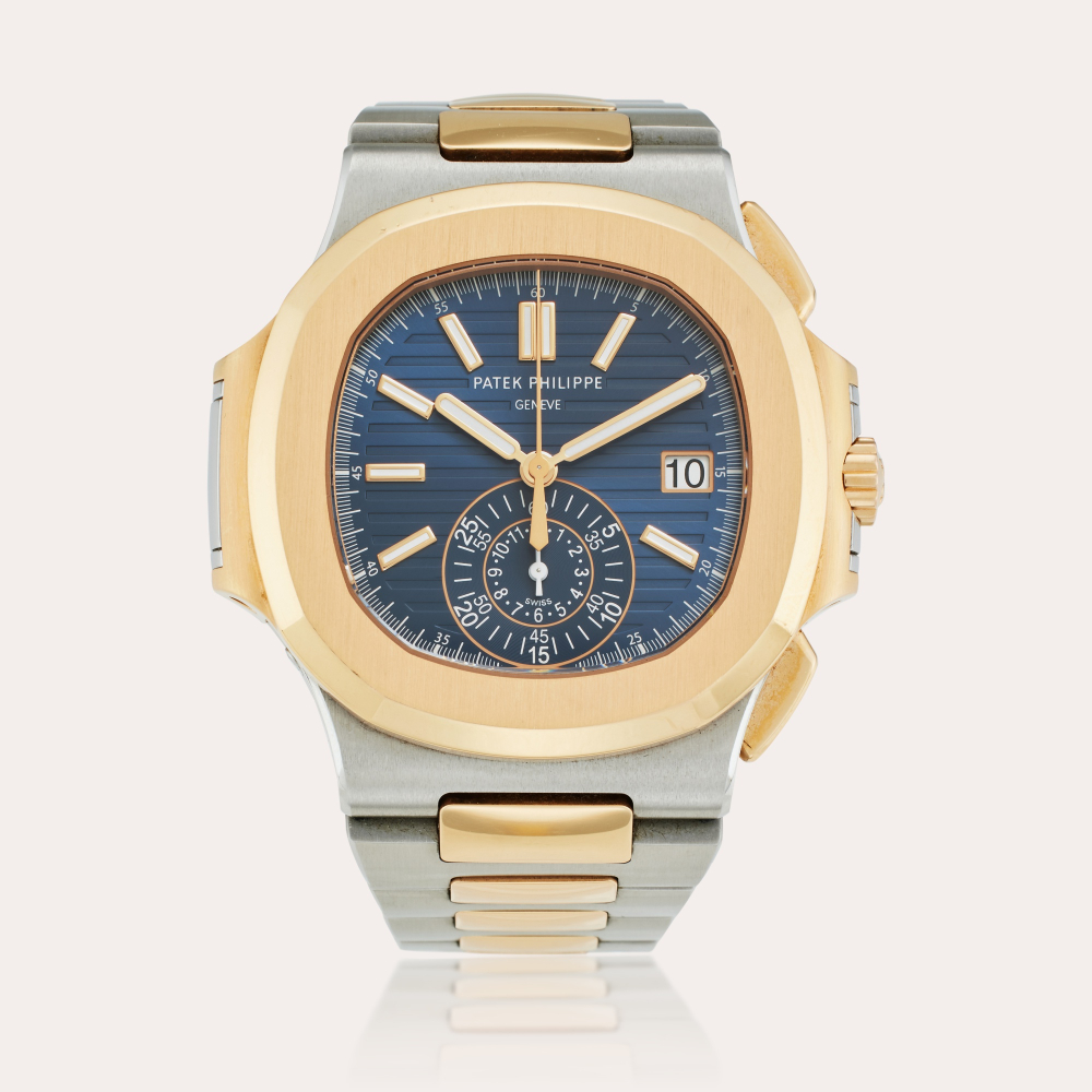 Patek Philippe Reference 5980/AR-001 Nautilus | A stainless steel and pink gold automatic flyback chronograph wristwatch with date and bracelet, Circa 2016