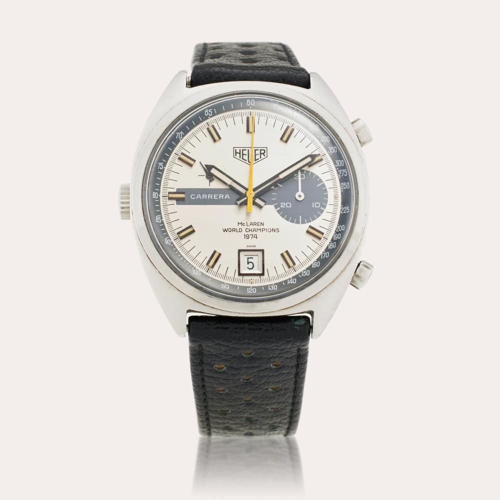HEUER CHAMPIONS Heuer Reference 11553 Carrera ‘McLaren' | A limited edition stainless steel chronograph wristwatch with date, Made for McLaren World Champions, Circa 1974
