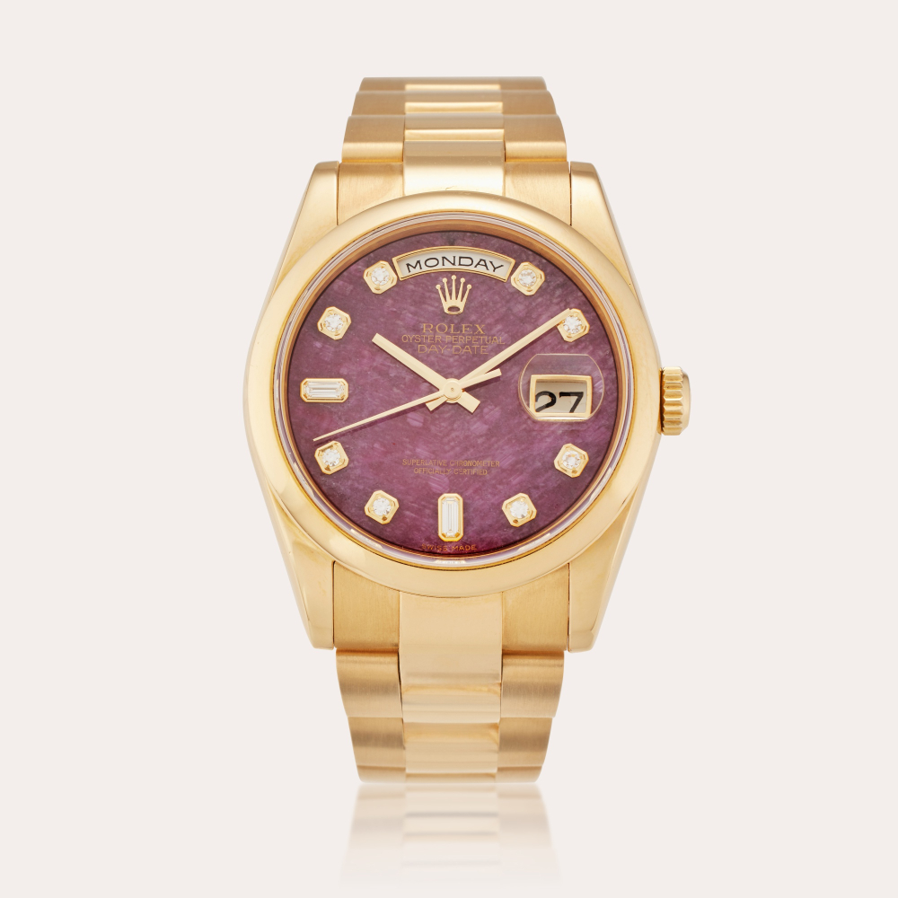 Rolex Reference 118208 Day-Date | A yellow gold automatic wristwatch with day, date, bracelet, and grossular garnet rubellite and diamond-set dial, Circa 2005