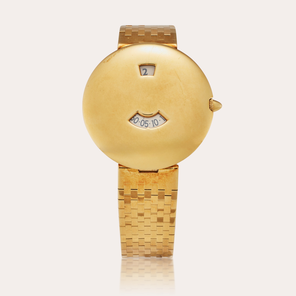 Chaumet Reference 10A Jump Hour | A rare yellow gold automatic jump hour bracelet watch, Circa 1995