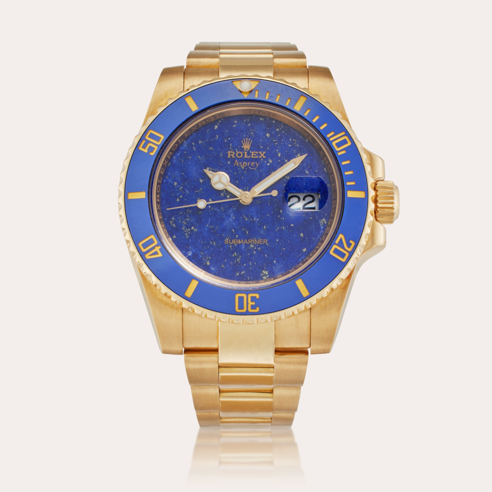 Asprey Reference 116618 Submariner | A yellow gold automatic wristwatch with date, bracelet, and lapis lazuli dial, Circa 2015