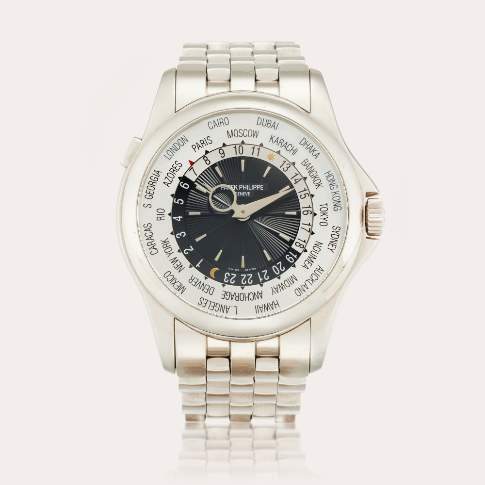 Patek Philippe Reference 5130/1G-010 | A white gold automatic world time wristwatch, Circa 2012