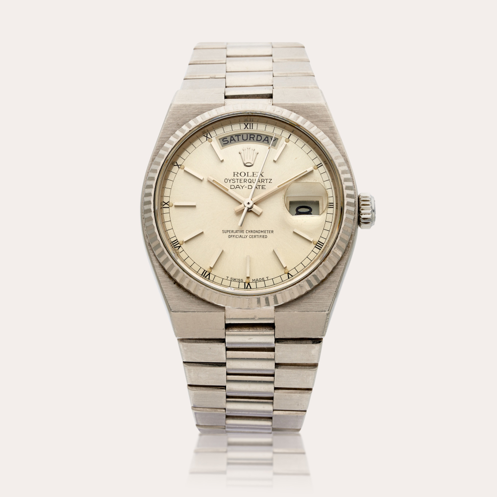 Rolex Reference 19019 Oysterquartz Day-Date | A white gold bracelet watch with day and date, Circa 1979
