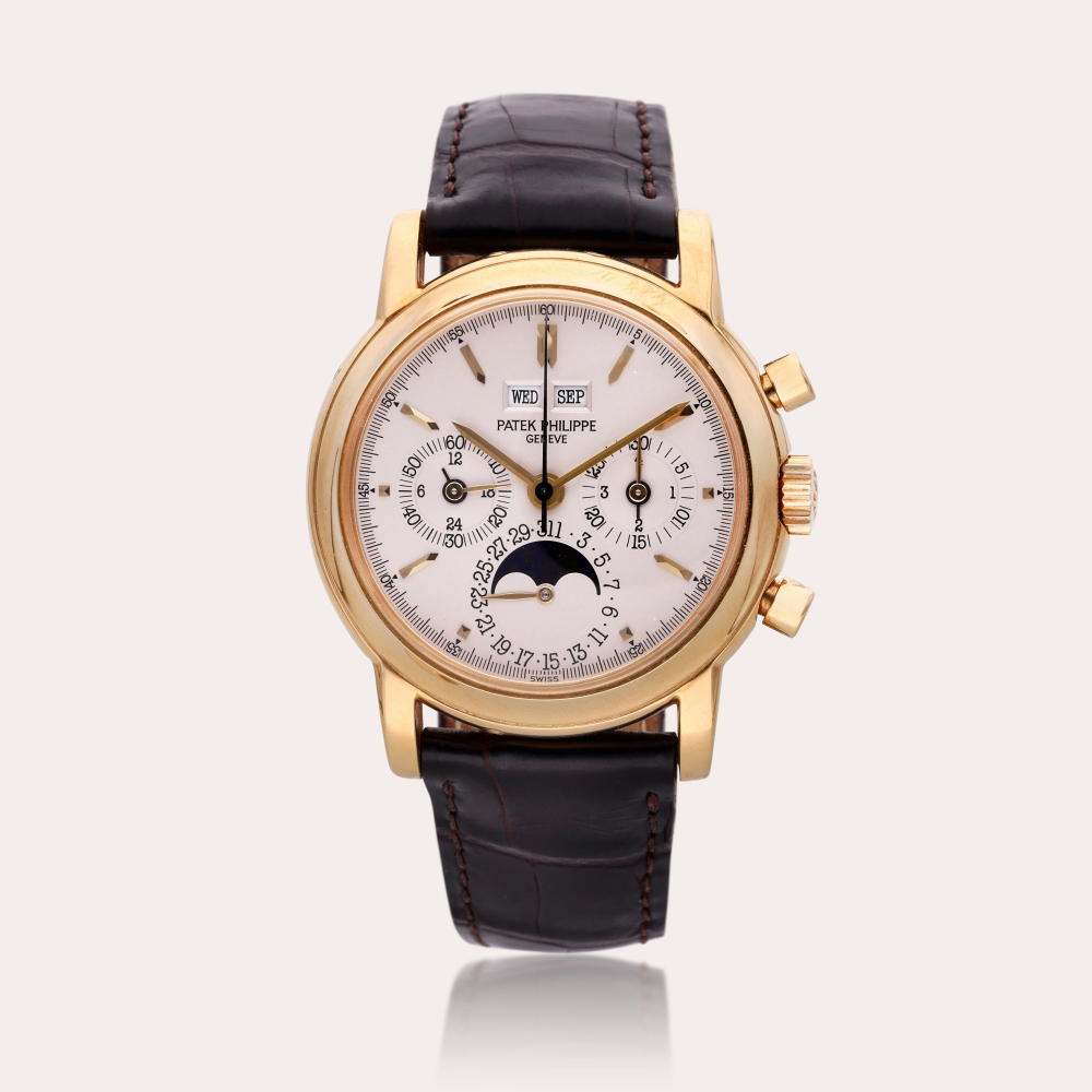 Patek Philippe Reference 3970 E ‘Third Series’ | A yellow gold perpetual calendar chronograph wristwatch with moon phases, leap year, and 24 hour indication, Made in 1994