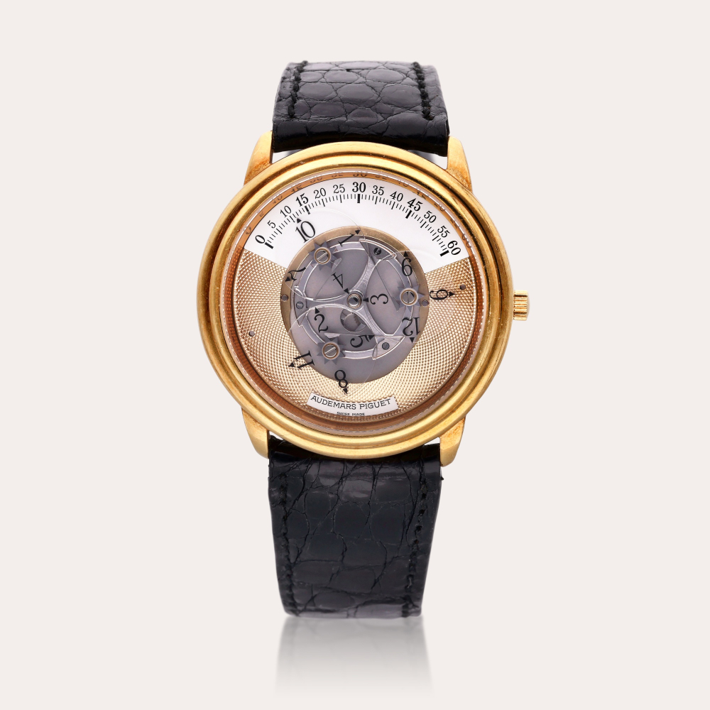 Audemars Piguet Reference 25720BA Starwheel | A yellow gold semi-skeletonized automatic wristwatch with rotating discs display, Circa 1995