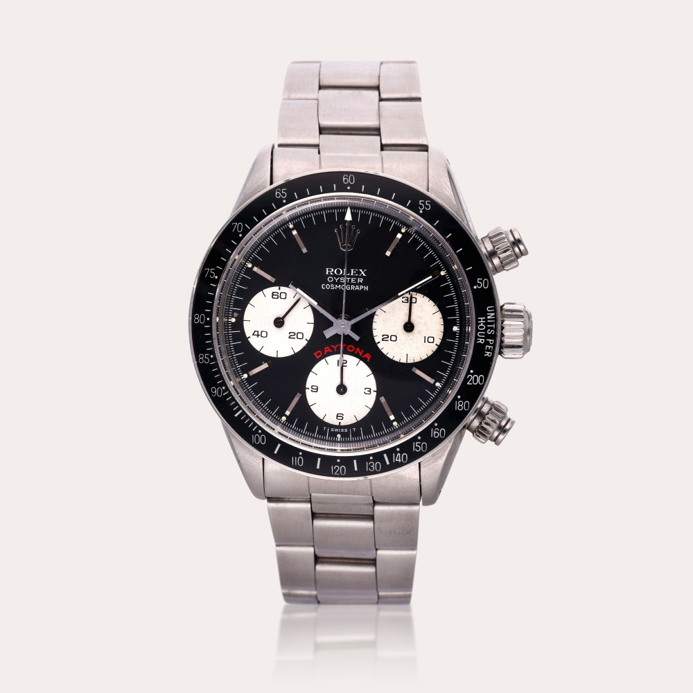 PROPERTY FROM THE FAMILY OF THE ORIGINAL OWNER Rolex Reference 6263 Daytona ‘Big Red’ | A stainless steel chronograph wristwatch with bracelet, Circa 1985
