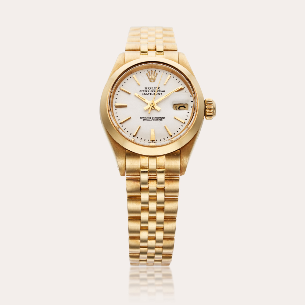 Rolex Reference 6916 Datejust | A yellow gold automatic wristwatch with date and bracelet, Circa 1973